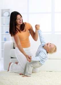 Mom Playing With Her Son on Nice Clean Carpet